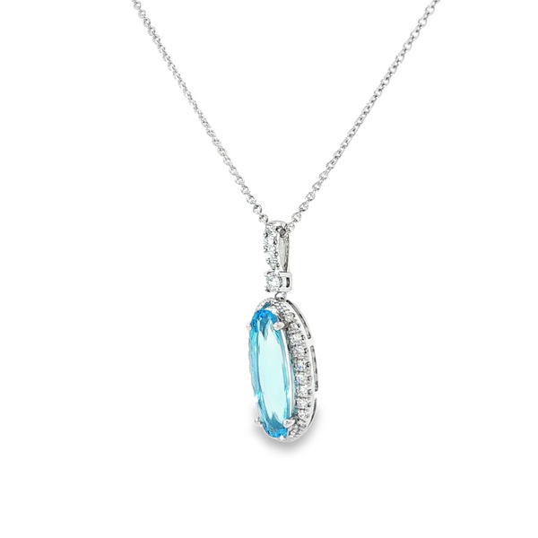 14k White Gold Oval Blue Topaz and Diamond Halo Pendant