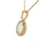 14K Yellow Gold .30ct Oval Opal Halo Pendant with Diamond Accents on 18" Cable Chain