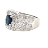 ESTATE 14K WHITE GOLD REGAL RING FEATURING OVAL BLUE SAPPHIRE WITH DIAMOND ACCENTS