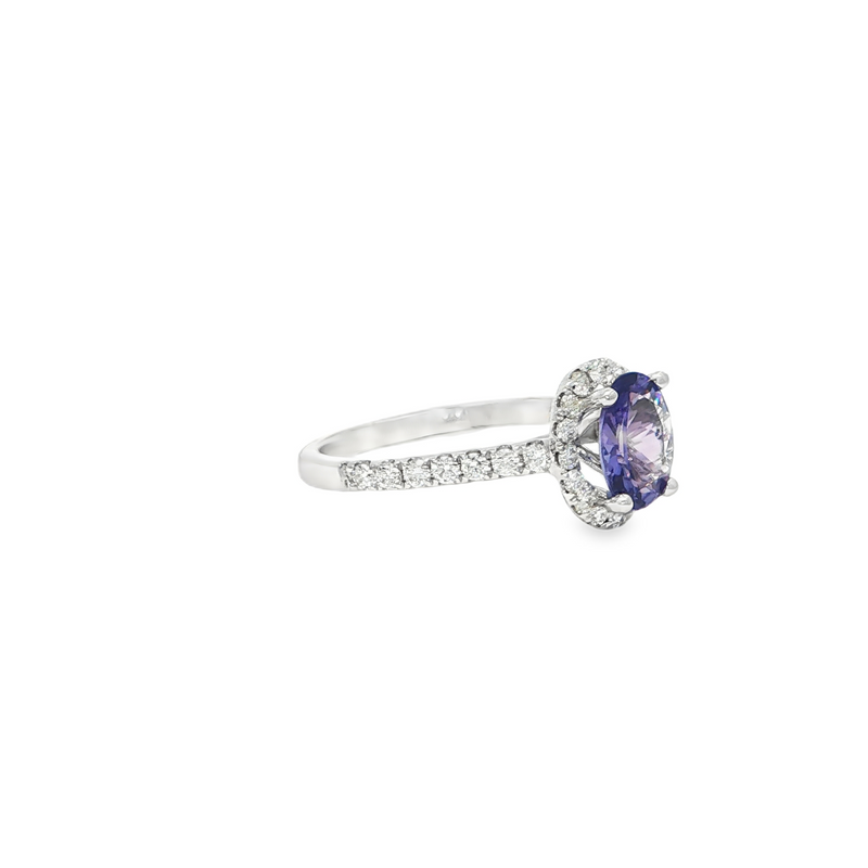 14k White Gold .96ct Oval Tanzanite and .42ctw Diamond Halo Ring