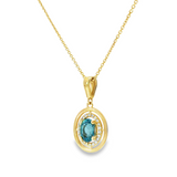 14k Yellow Gold Oval Blue Topaz and Diamond Halo Pendant